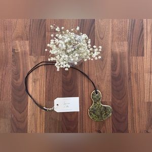 Handmade clay pendant, brown/yellow/green colors mixed